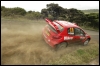 Daniel Carlsson autol Peugeot 206 WRC Uus-Meremaa ralli 21. kiiruskatsel. (18.04.2004) Reuters / Scanpix